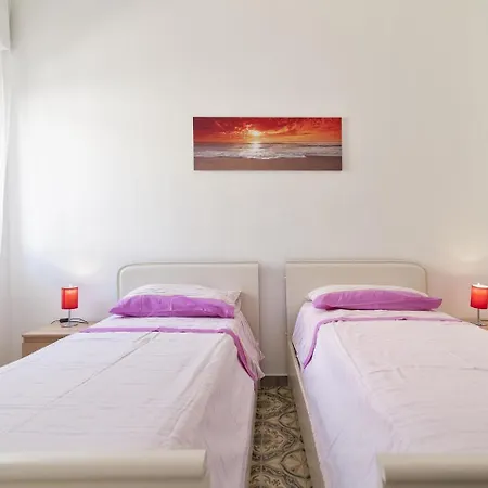 Locazione Turistica Beach Holiday home *